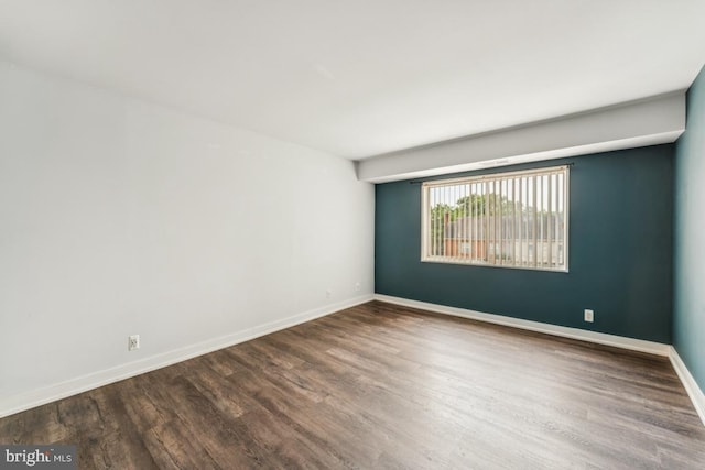 12001 Old Columbia Pike Unit 407, Silver Spring, MD 20904 - unfurnished room featuring wood finished floors and baseboards