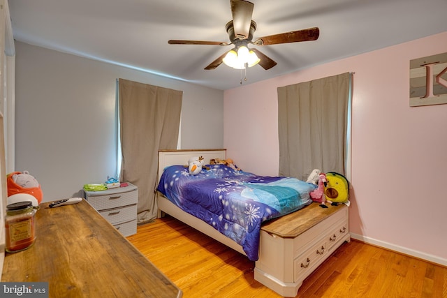 436 Strobridge Rd, Inwood, WV 25428 - bedroom with light wood-style floors, ceiling fan, and baseboards