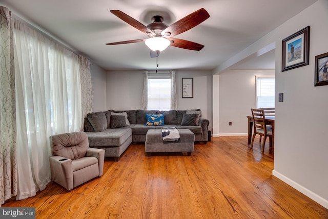 436 Strobridge Rd, Inwood, WV 25428 - living area with a ceiling fan, light wood-style flooring, healthy amount of natural light, and baseboards