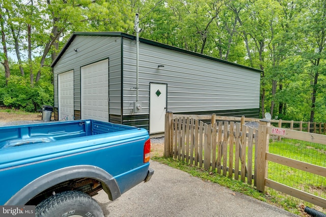 436 Strobridge Rd, Inwood, WV 25428 - detached garage featuring fence