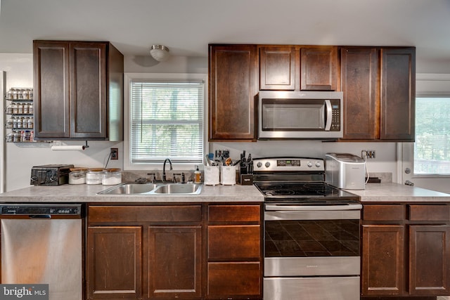 436 Strobridge Rd, Inwood, WV 25428 - kitchen featuring stainless steel appliances, a sink, light countertops, and dark brown cabinets