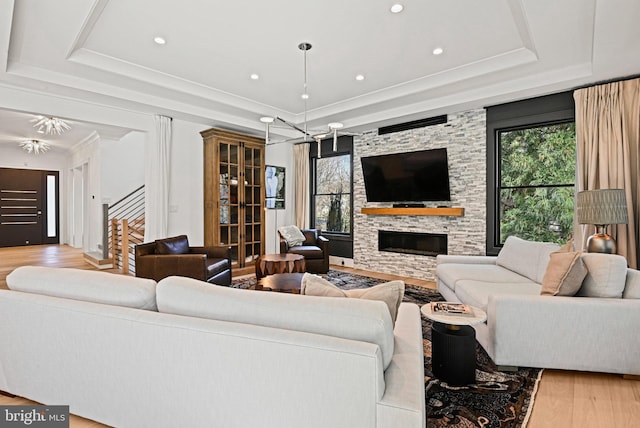 1564 Forest Villa Ln, Mclean, VA 22101 - living area with a raised ceiling, wood finished floors, a fireplace, recessed lighting, and crown molding