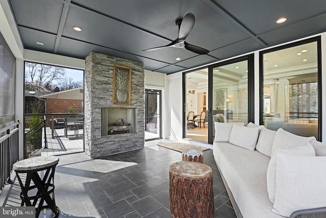 1564 Forest Villa Ln, Mclean, VA 22101 - living area with a ceiling fan, recessed lighting, an outdoor stone fireplace, and coffered ceiling