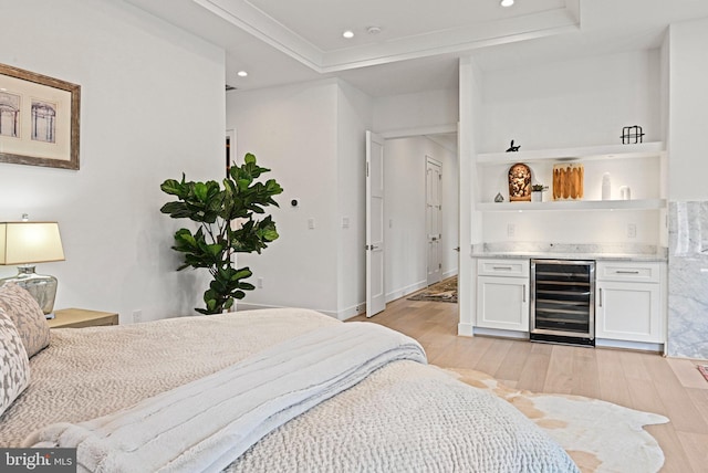 1564 Forest Villa Ln, Mclean, VA 22101 - bedroom with beverage cooler, a bar, light wood-type flooring, a raised ceiling, and recessed lighting