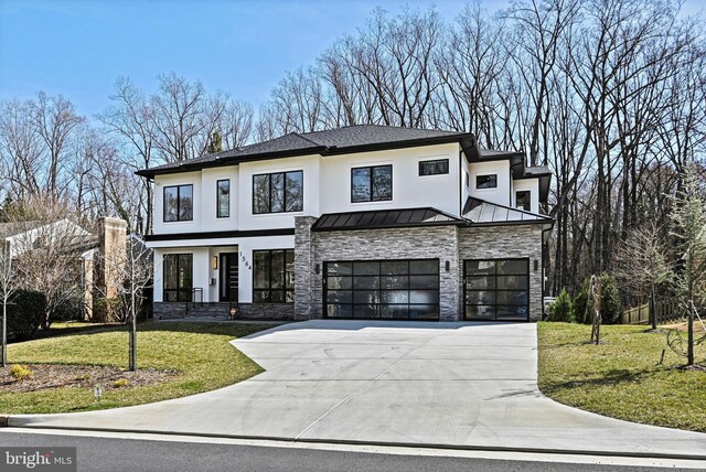 1564 Forest Villa Ln, Mclean, VA 22101 - modern home featuring a garage, stone siding, driveway, a standing seam roof, and a front lawn