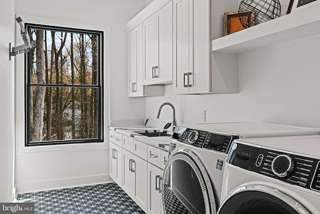 1564 Forest Villa Ln, Mclean, VA 22101 - clothes washing area featuring washing machine and dryer, healthy amount of natural light, cabinet space, and dark flooring