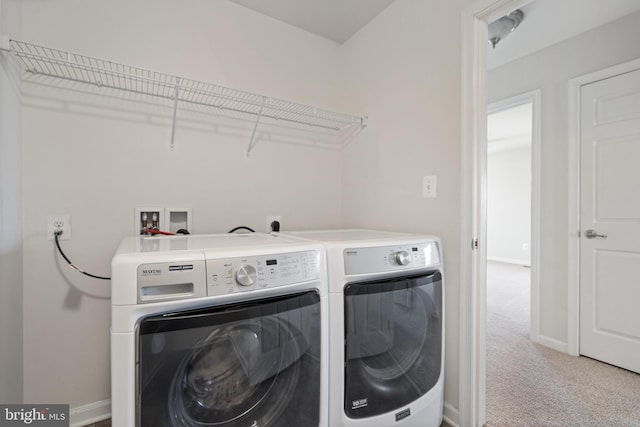 100 Fiesta Dr, Stephenson, VA 22656 - clothes washing area featuring washer and clothes dryer, carpet flooring, and baseboards