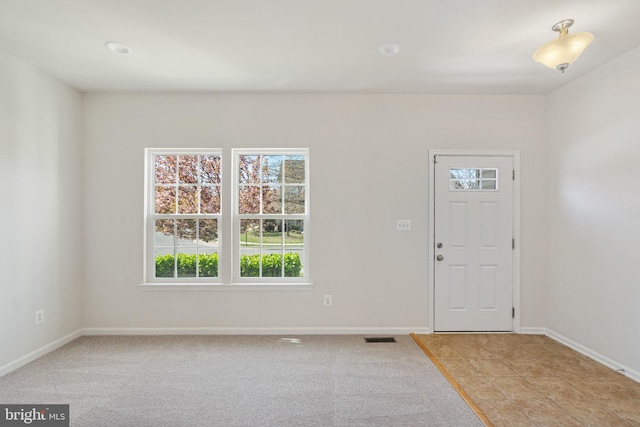 100 Fiesta Dr, Stephenson, VA 22656 - entryway with baseboards and light colored carpet