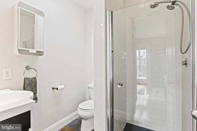 220 S E Ave, Baltimore, MD 21224 - bathroom with a shower stall, toilet, vanity, baseboards, and tile patterned flooring