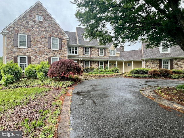 201 Dogwood Slope Rd, Wilmington, DE 19807 - view of front of home with stone siding and asphalt driveway