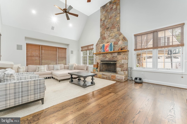 201 Dogwood Slope Rd, Wilmington, DE 19807 - living room featuring high vaulted ceiling, a ceiling fan, hardwood / wood-style flooring, and a fireplace