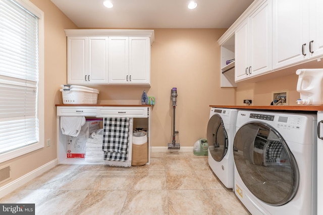 201 Dogwood Slope Rd, Wilmington, DE 19807 - laundry room featuring washing machine and clothes dryer, cabinet space, healthy amount of natural light, and recessed lighting