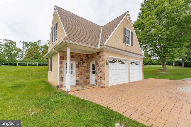 201 Dogwood Slope Rd, Wilmington, DE 19807 - garage featuring decorative driveway
