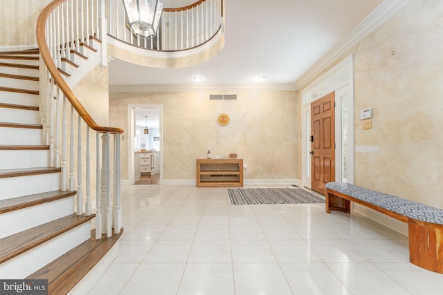201 Dogwood Slope Rd, Wilmington, DE 19807 - entryway with ornamental molding, stairway, and tile patterned floors