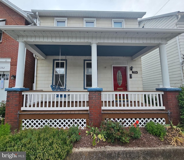 304 Pulaski St, Cumberland, MD 21502 - view of front facade with covered porch