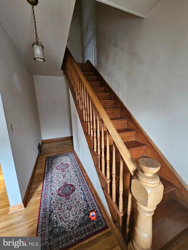 304 Pulaski St, Cumberland, MD 21502 - stairway featuring wood finished floors and baseboards