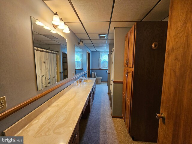 304 Pulaski St, Cumberland, MD 21502 - full bath with a drop ceiling, vanity, and toilet