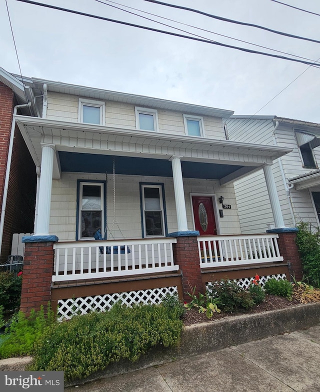 304 Pulaski St, Cumberland, MD 21502 - view of front of home featuring covered porch