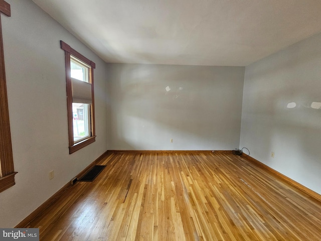 304 Pulaski St, Cumberland, MD 21502 - empty room with wood-type flooring and baseboards