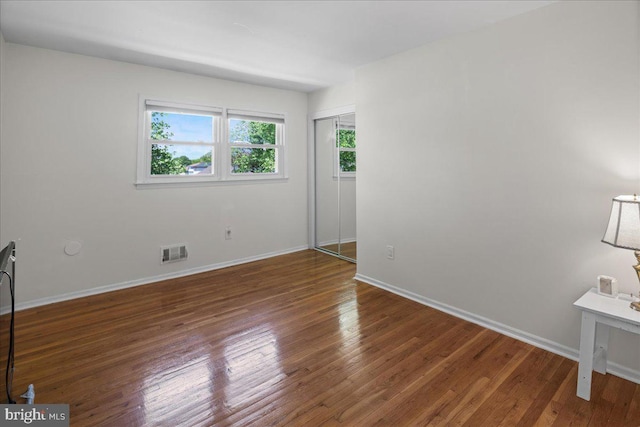 19 Strassberg Ct, Hamilton, NJ 08690 - unfurnished bedroom featuring wood finished floors, baseboards, and a closet