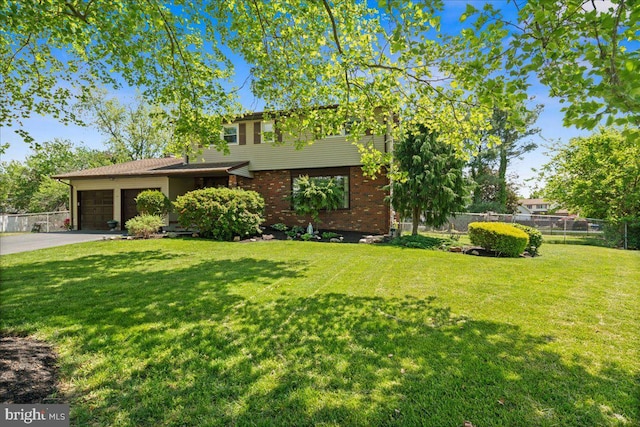 19 Strassberg Ct, Hamilton, NJ 08690 - view of front of house with an attached garage, brick siding, and driveway