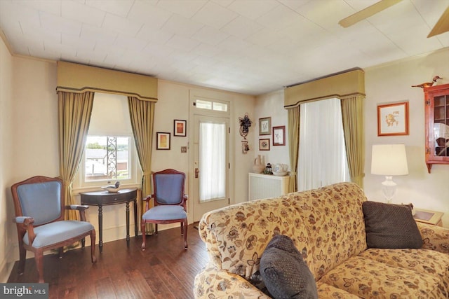 bedroom with wood-type flooring and crown molding