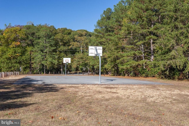 11545 Tomahawk Trl W, Lusby, MD 20657 - view of basketball court featuring a forest view and community basketball court