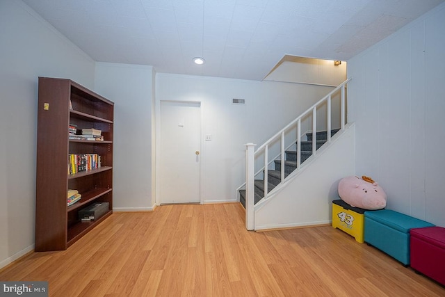 517 Righters Mill Rd, Penn Valley, PA 19072 - entryway featuring wood finished floors, stairway, and baseboards
