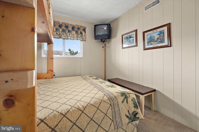 128 Captains Quarters Rd Unit 201, Ocean City, MD 21842 - carpeted bedroom with a textured ceiling
