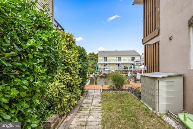 128 Captains Quarters Rd Unit 201, Ocean City, MD 21842 - view of yard featuring a dock