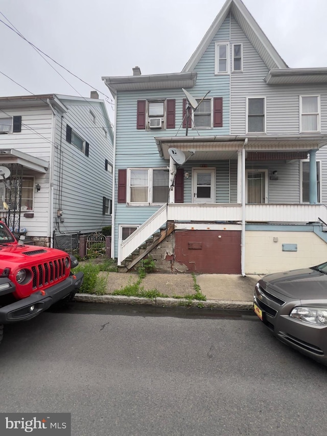 411 S Vine St, Shamokin, PA 17872 - townhome / multi-family property with cooling unit and a chimney