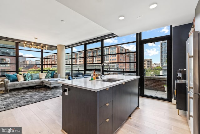 1300 4th St SE Unit 404, Washington, DC 20003 - sunroom / solarium with a sink, a chandelier, a view of city, and healthy amount of natural light