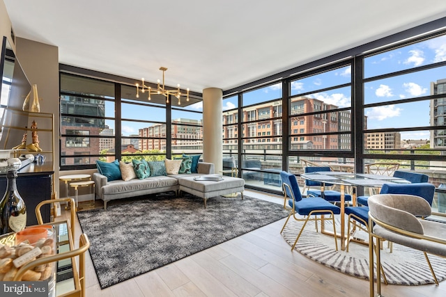 1300 4th St SE Unit 404, Washington, DC 20003 - sunroom with a chandelier and a city view