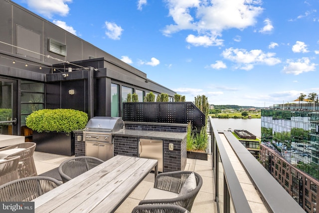1300 4th St SE Unit 404, Washington, DC 20003 - view of patio / terrace with outdoor dining space and a water view