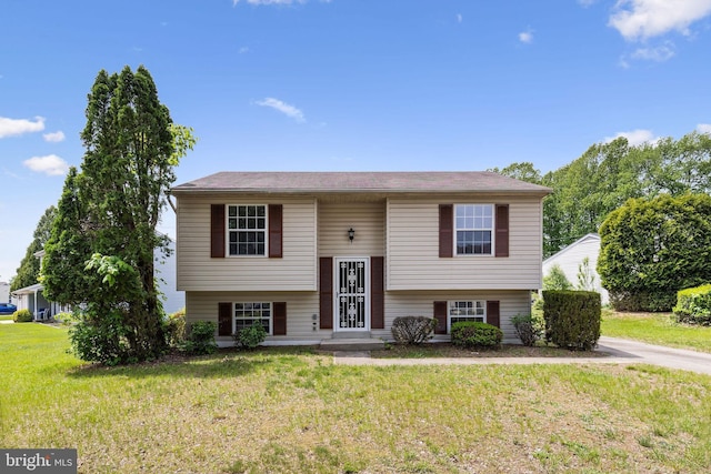 1207 Blithe Ct, Upper Marlboro, MD 20774 - bi-level home featuring a front lawn