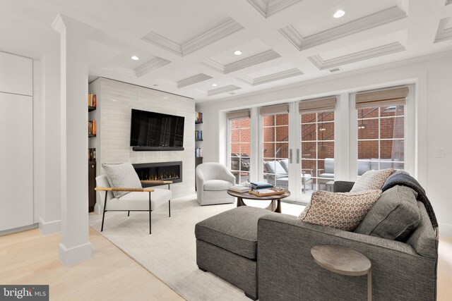 2122 N St NW Unit 1, Washington, DC 20037 - living room with crown molding, coffered ceiling, beamed ceiling, a premium fireplace, and wood finished floors