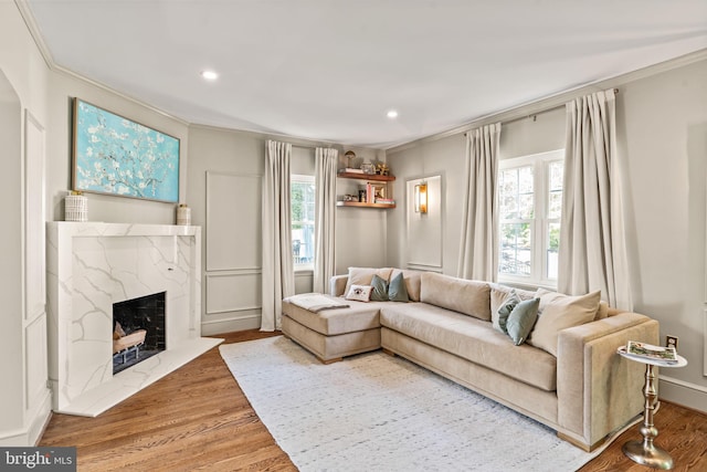 3503 Norris Pl, Alexandria, VA 22305 - living room with crown molding, wood finished floors, a fireplace, and recessed lighting