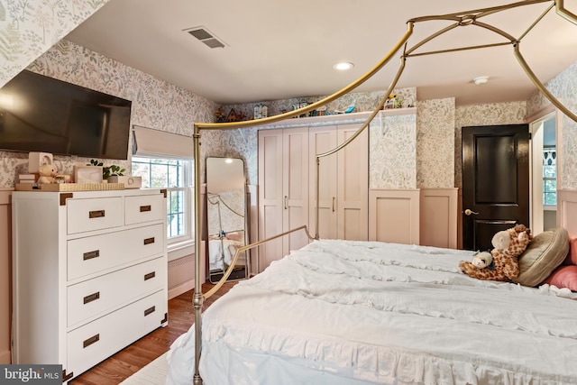 3503 Norris Pl, Alexandria, VA 22305 - bedroom with wallpapered walls, dark wood finished floors, and a wainscoted wall