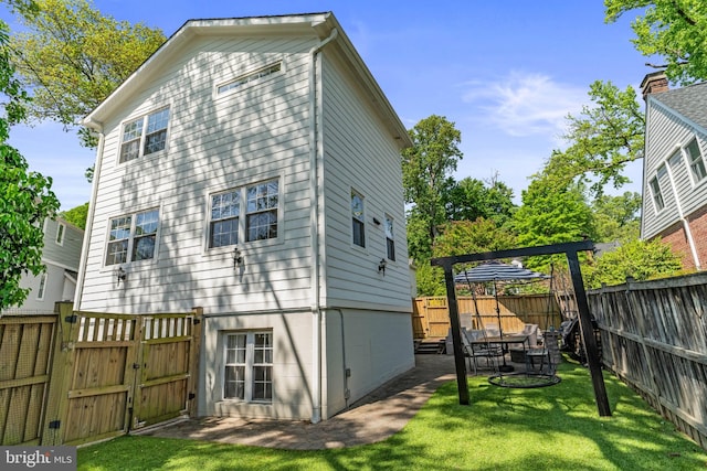 3503 Norris Pl, Alexandria, VA 22305 - rear view of house featuring a gate and a patio