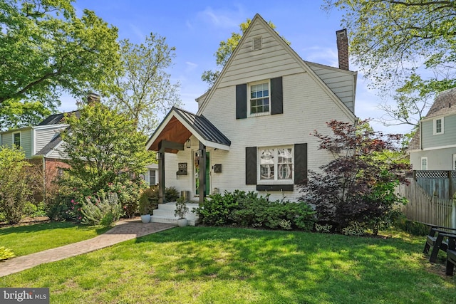 3503 Norris Pl, Alexandria, VA 22305 - view of front of property with a chimney and brick siding