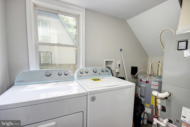 411 S Blvd, Salisbury, MD 21801 - laundry room with washing machine and clothes dryer, water heater, and heating unit