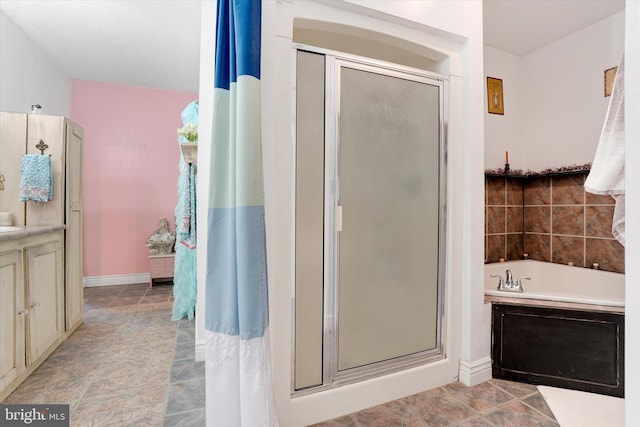 13450 Millstone Cir, Hancock, MD 21750 - full bathroom with a shower stall, a garden tub, vanity, and baseboards