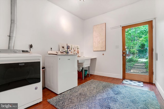 13450 Millstone Cir, Hancock, MD 21750 - clothes washing area featuring washer and dryer, wood finished floors, and baseboards