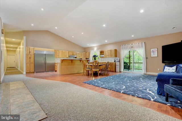 13450 Millstone Cir, Hancock, MD 21750 - living room featuring light wood finished floors, high vaulted ceiling, and recessed lighting