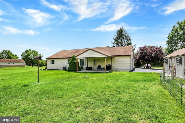 30 Foxanna Dr, Carlisle, PA 17015 - back of property featuring a patio area