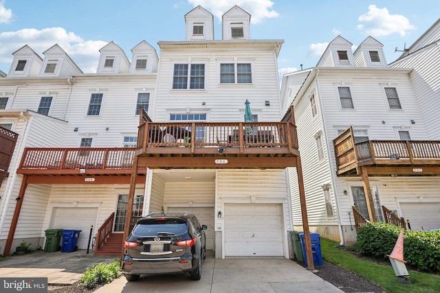 806 Ryan St, Baltimore, MD 21230 - back of house with concrete driveway and an attached garage