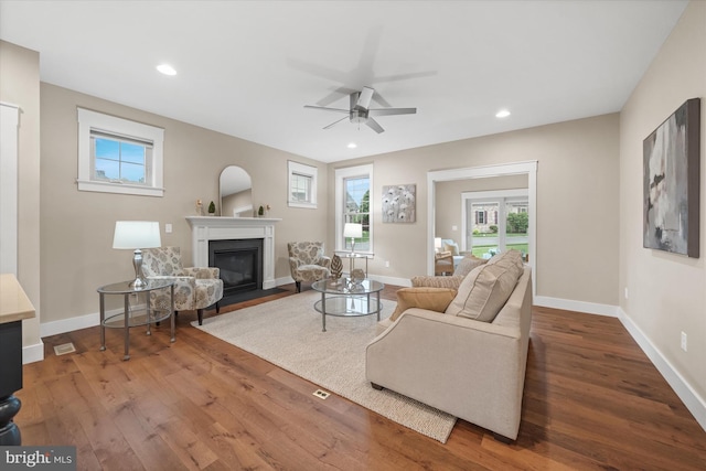 843 Summer Breeze Path, Cochranville, PA 19330 - living area featuring a fireplace with flush hearth, a ceiling fan, wood finished floors, baseboards, and recessed lighting