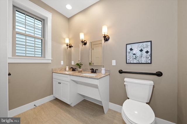 843 Summer Breeze Path, Cochranville, PA 19330 - bathroom with baseboards, toilet, and double vanity