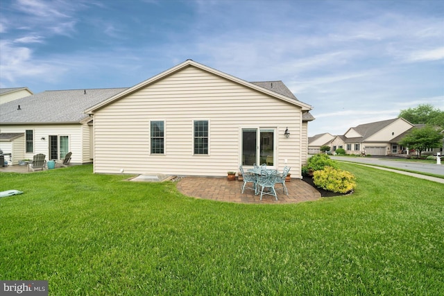 843 Summer Breeze Path, Cochranville, PA 19330 - rear view of property with a patio area, a lawn, and a shingled roof