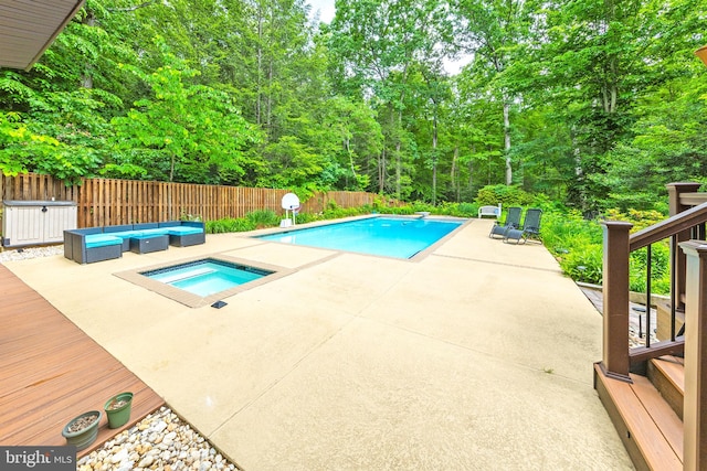 8323 Morningside Dr, Manassas, VA 20112 - view of swimming pool featuring an in-ground hot tub, a fenced backyard, a patio, and a deck